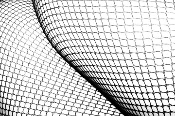 Abstract grunge black and white distressed transparent texture fabric fishnet netting overlay background