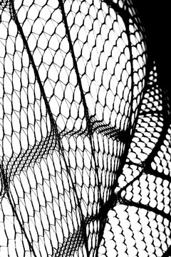 Abstract grunge black and white distressed transparent texture fabric fishnet netting overlay background