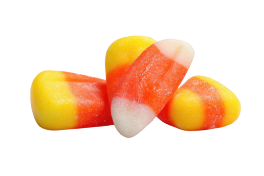 A cluster of classic tricolored candy corn, featuring white, orange, and yellow segments, isolated against a solid dark transparent background. background removed