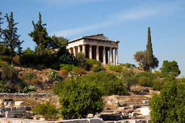 Fototapeta premium emple of Hephaestus, Athens: Ancient Greek Marvel Amidst Lush Nature