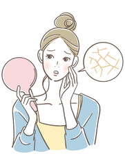 手鏡を見る女性