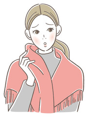 ストールを肩に掛ける女性