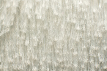 White soft fabric with long pile in macro for abstract backgrounds and textural solutions