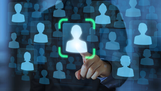 Targeting and personalization of customer communication. Marketing automation system. Marketer tapping a customer icon.