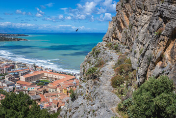 Large massif rock above Old Town of Cefalu city located on the Tyrrhenian Sea on Sicily Island in Italy
