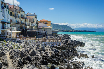 Residential buildings on the coast in historic part of Cefalu town on Sicily Island, Italy