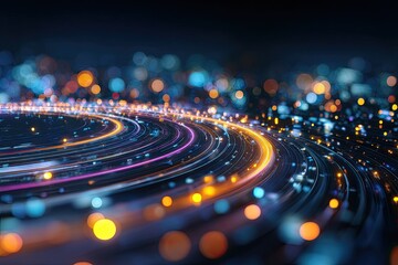Abstract, dynamic image of curved, glowing light trails with bokeh in a blurred cityscape
