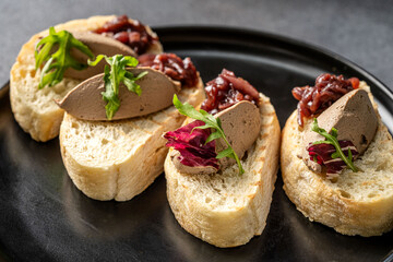 Bruschetta with pate and caramelized onion
