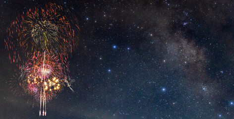 Fireworks with blur milky way background