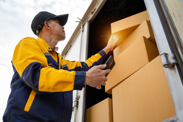 Unloading delivery boxes warehouse business operations outdoor side view logistics management