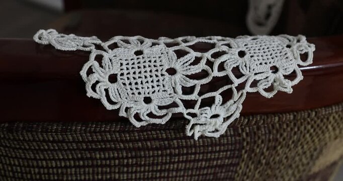 Shallow depth of field (selective focus) details with Romanian communist era Milieu (Mileu or macrame) decoration.