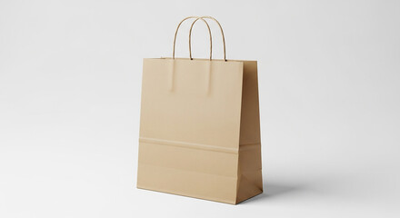 A plain brown paper shopping bag with handles, isolated on a white background, perfect for retail or branding mockups