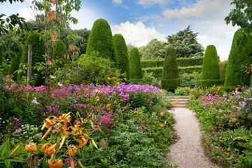 English country garden with clipped Yew trees