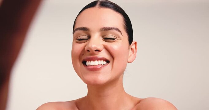 Laugh, selfie and makeup of woman in studio for social media, confidence and white background. Mockup space, profile picture and happy influencer with facial glow, cosmetology and cosmetics with pout