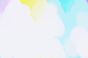 Bright white pastel background with cloud-like blue, yellow, violet and soft pink stains, high key, airy, large, minimal overlay. copy space