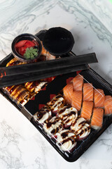 Set of fresh sushi on light background.