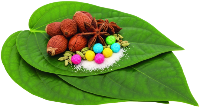 Isolated betel leaves with areca nuts, anise, sugar and mukhwas, a traditional Indian mouth freshener