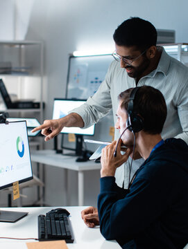 Businessman Call center, Customer Service support Trainer Coaching in customer support, telemarketing, sale at office. Male Operator in training session for Service Quality and Client Communication.