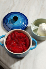 Dessert of Stewed Fruit and Ice Cream in Blue Pot
