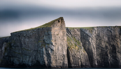 Image Serene And Timeless Essence Of A Solitary Cliff Emphasizing Its Isolated And Tranquil Nature