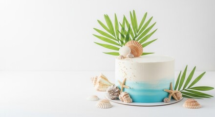 Fototapeta premium A white and blue ombre cake decorated with seashells starfish and palm leaves on a bright white background