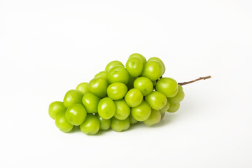 A bunch of fresh green grapes with large berries on a white background. Isolated