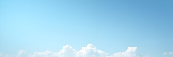 A serene sky blue background with fluffy clouds, evoking calmness and tranquility. Ideal minimalist composition with generous copy space for text.