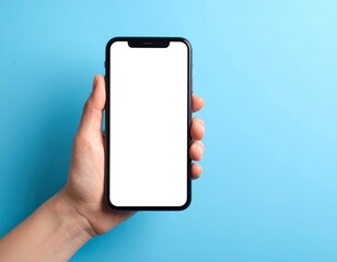 Hand holding smartphone with blank screen