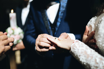 bride and groom holding hands