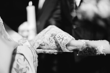 bride and groom holding hands
