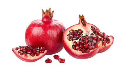 Whole and halved pomegranate fruit isolated on a transparent background