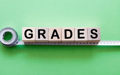 Measuring Educational Achievement with Alphabetical Blocks on a Green Background