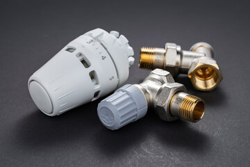 Thermostatic radiator valves TRV . Self-regulating three axis valve with the possibility of connecting electric heating element