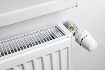 Thermostatic head and radiator valve. Energy saving and save money concept.