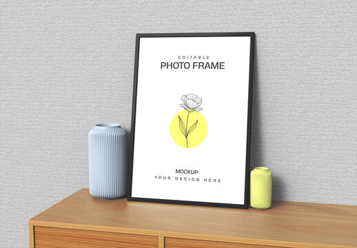 Modern Photo Frame Poster PSD Mockup on Wooden Table