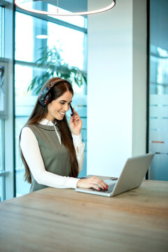 Customer service specialist with professional headset providing dedicated client assistance