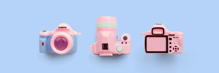 Colorful toy camera on pastel color background