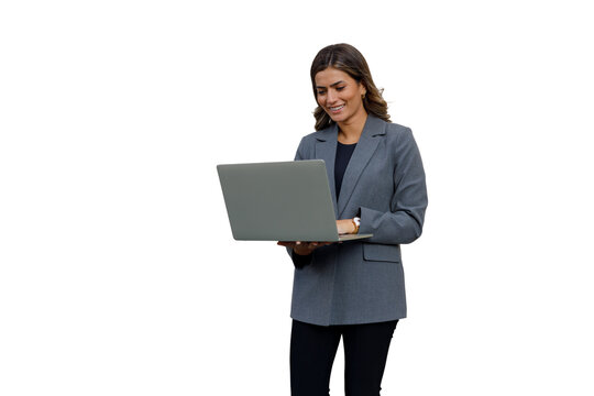 Professional businesswoman using laptop, standing and smiling, working remotely on transparent background