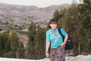 Naklejka premium Mature woman traveling and exploring mountain landscape