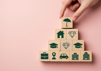 Hand placing insurance symbol block on pyramid structure