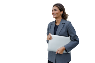 Successful and confident businesswoman in a blazer is shown walking while holding a laptop and smiling, with a transparent background