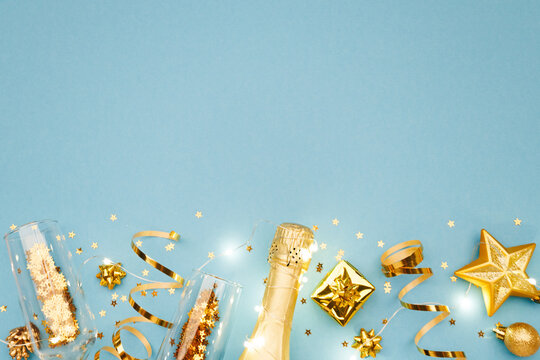 Christmas background with golden decoration on color background, space for text