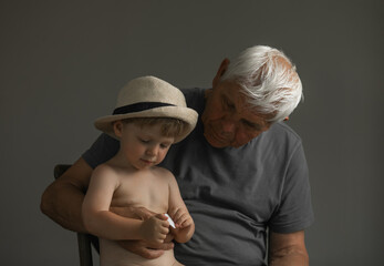 Portrait of Grandfather and Grandson in Soft Natural Light
