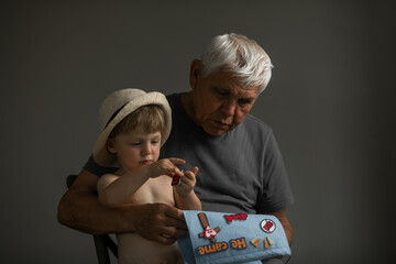 Portrait of Grandfather and Grandson in Soft Natural Light