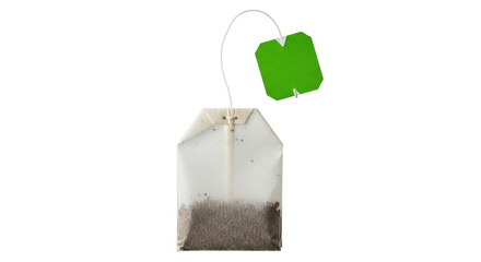 Isolated tea bag with green label for hot beverage preparation in the morning or afternoon © Trym