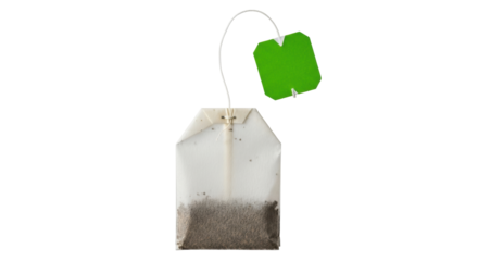 Isolated tea bag with green label for hot beverage preparation in the morning or afternoon