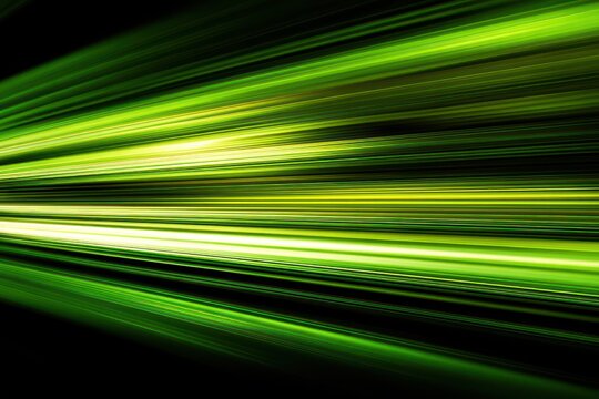 Abstract fast-moving green light stripes with motion blur