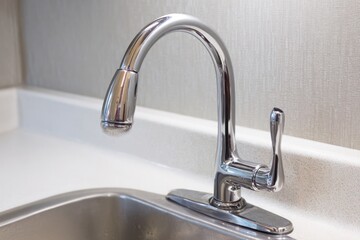 Modern kitchen faucet and sink with running water