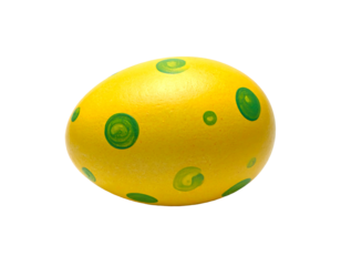 Bright yellow easter egg with green spots isolated on transparent background