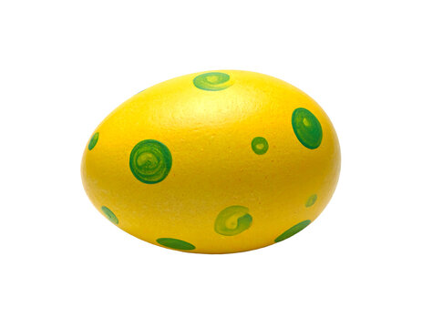 Bright yellow easter egg with green spots isolated on transparent background